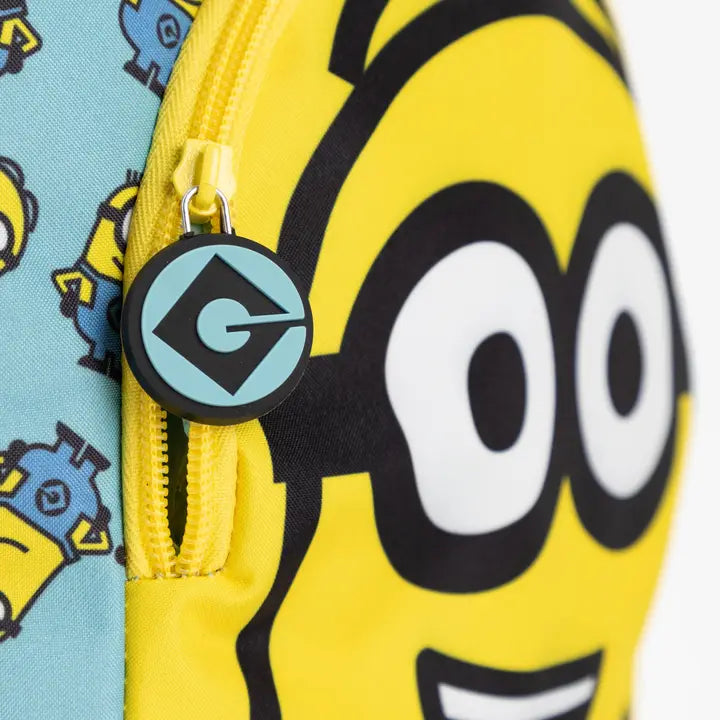 Kids More Than a Minion backpack featuring large Minion character graphic, blue and yellow design, front zip pocket, mesh side pocket and padded straps