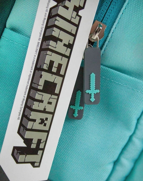 Minecraft Diamond backpack in turquoise and grey with pixel face design and front Minecraft patch.